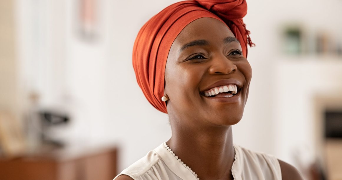 Smiling,Middle,Aged,African,American,Woman,With,Orange,Headscarf.,Beautiful