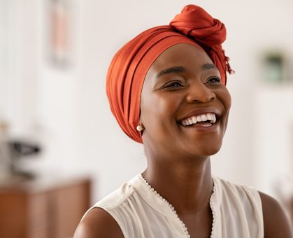 Smiling,Middle,Aged,African,American,Woman,With,Orange,Headscarf.,Beautiful